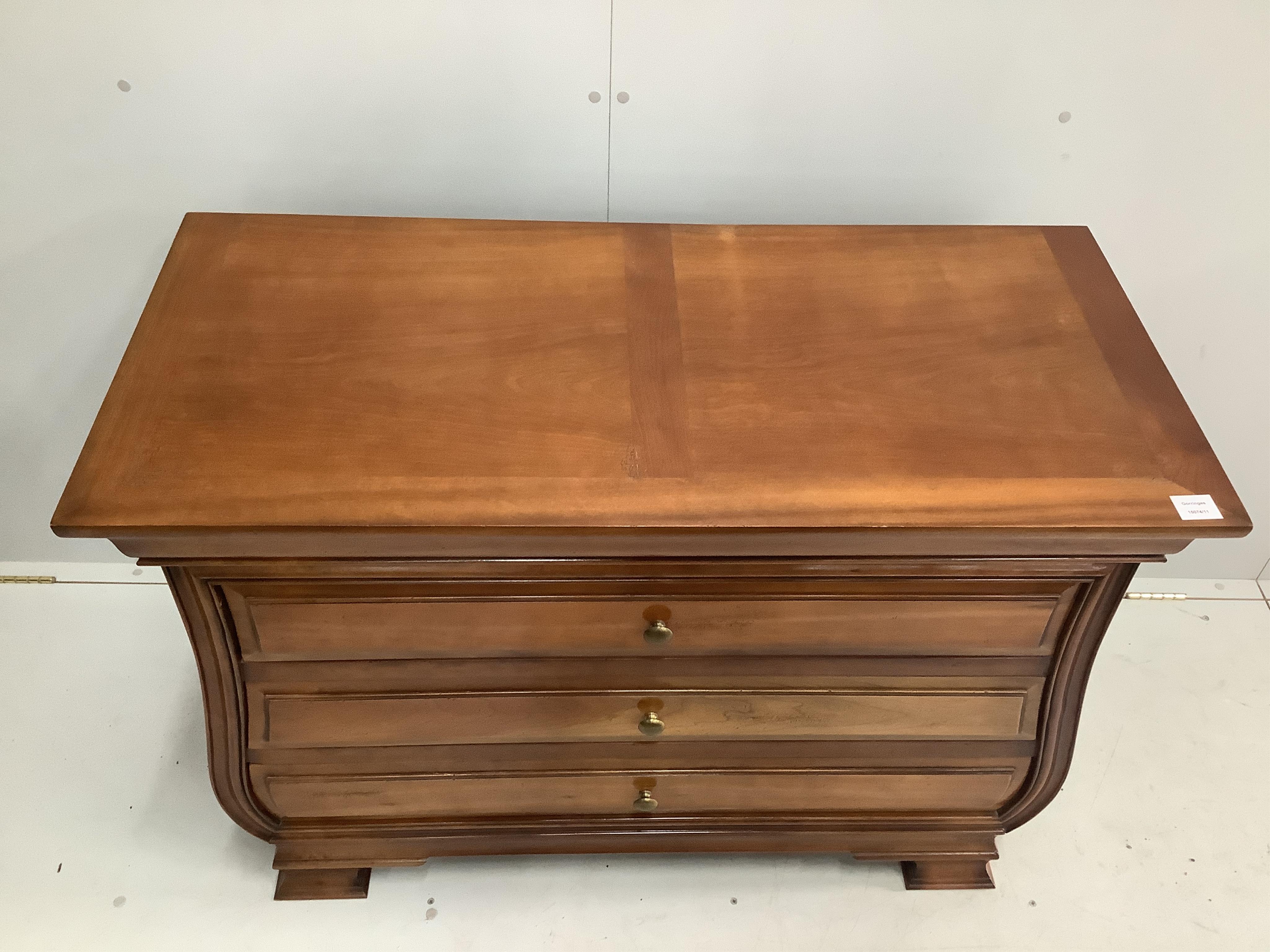 A reproduction 'And So To Bed' French style cherry four drawer commode, width 110cm, depth 52cm, height 82cm. Condition - good